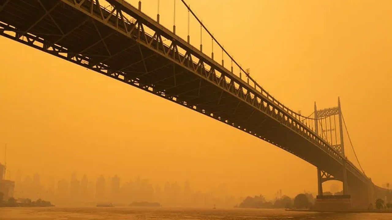 Canadian Wildfires Darken New York: Smoke Triggers Temperature Drop, Health Crisis