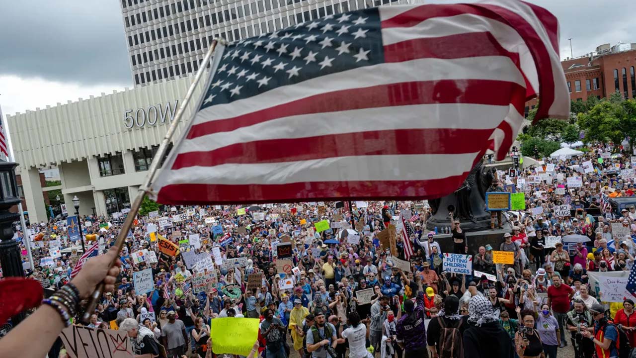 Nationwide Protests Erupt Against Trumps Immigration Crackdown 